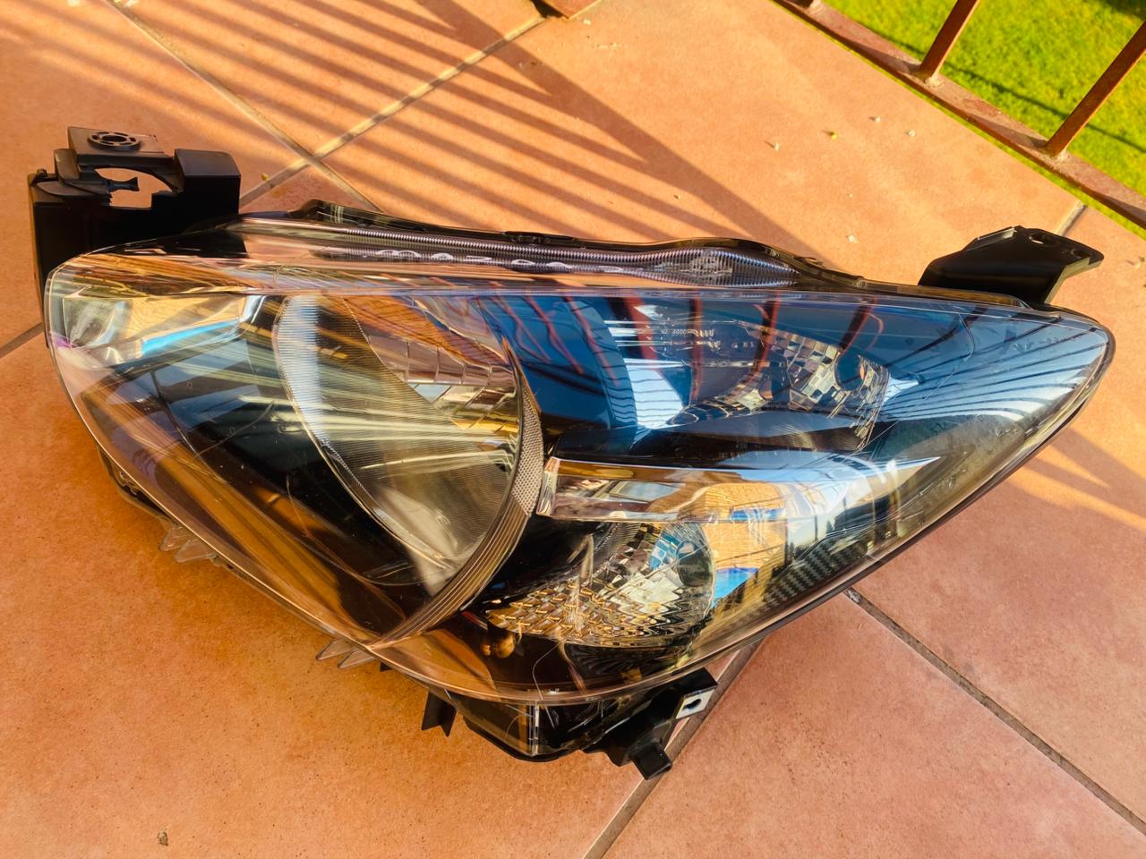 Mazda 2 left headlight for sale in good condition - Private Seller