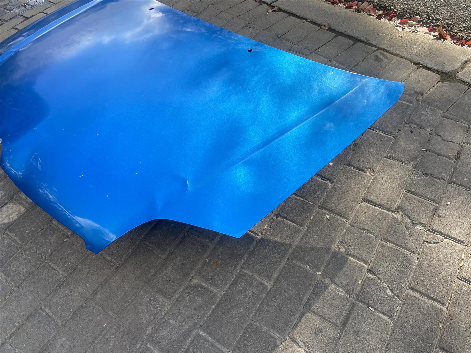 2006 TOYOTA COROLLA RUNX SHAPE BONNET HOOD FOR SALE. IN EXCELLENT CONDITION - Private Seller