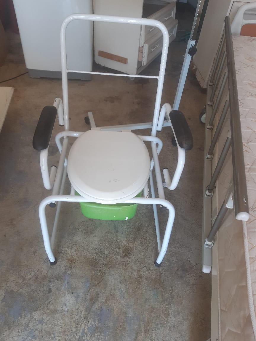 Adjustable hospital bed with mattress, wheelchair and commode for sale