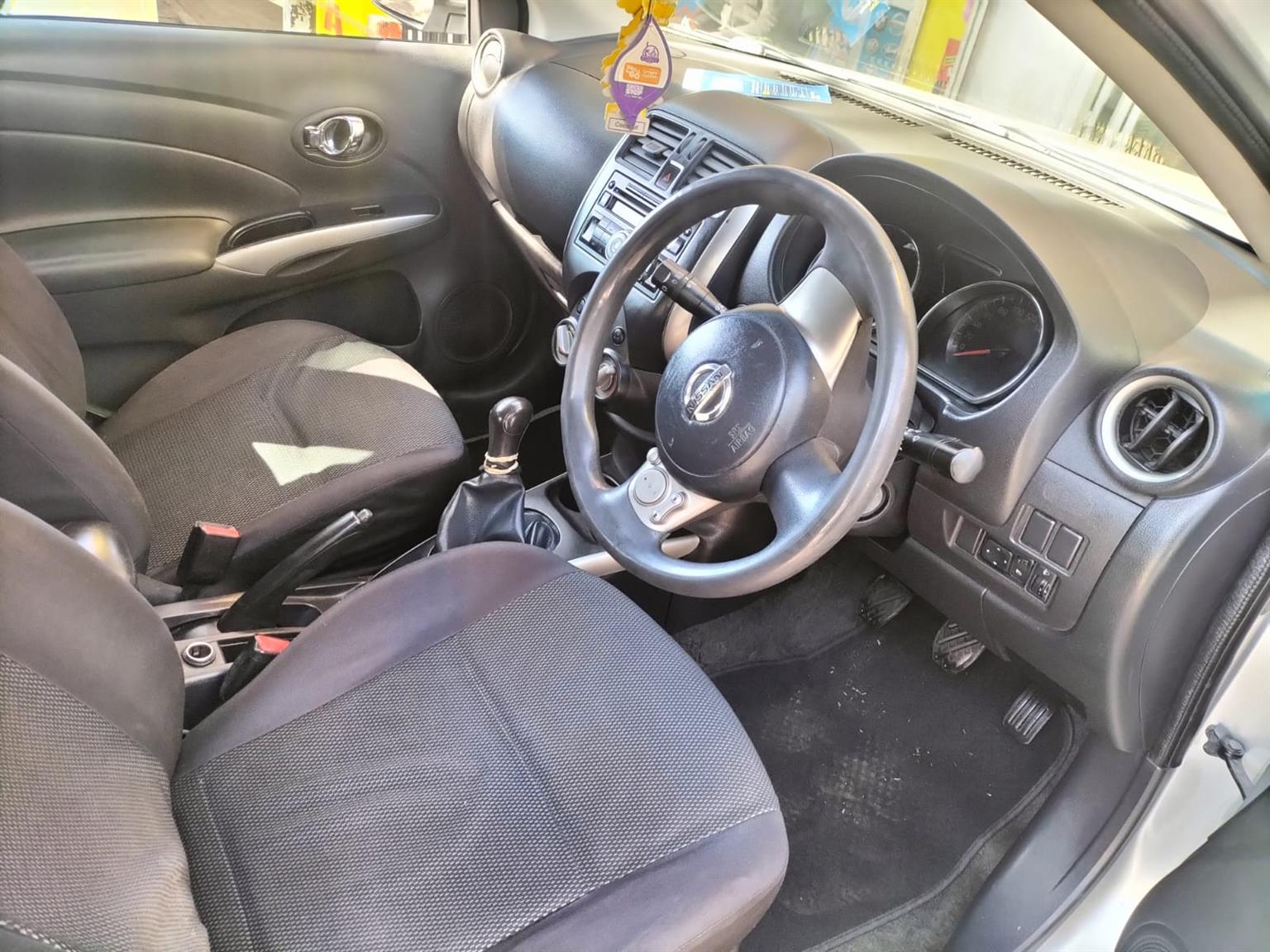 2015 Silver Nissan Almera sedan 1.5 Manual milage 86,000 km petrol