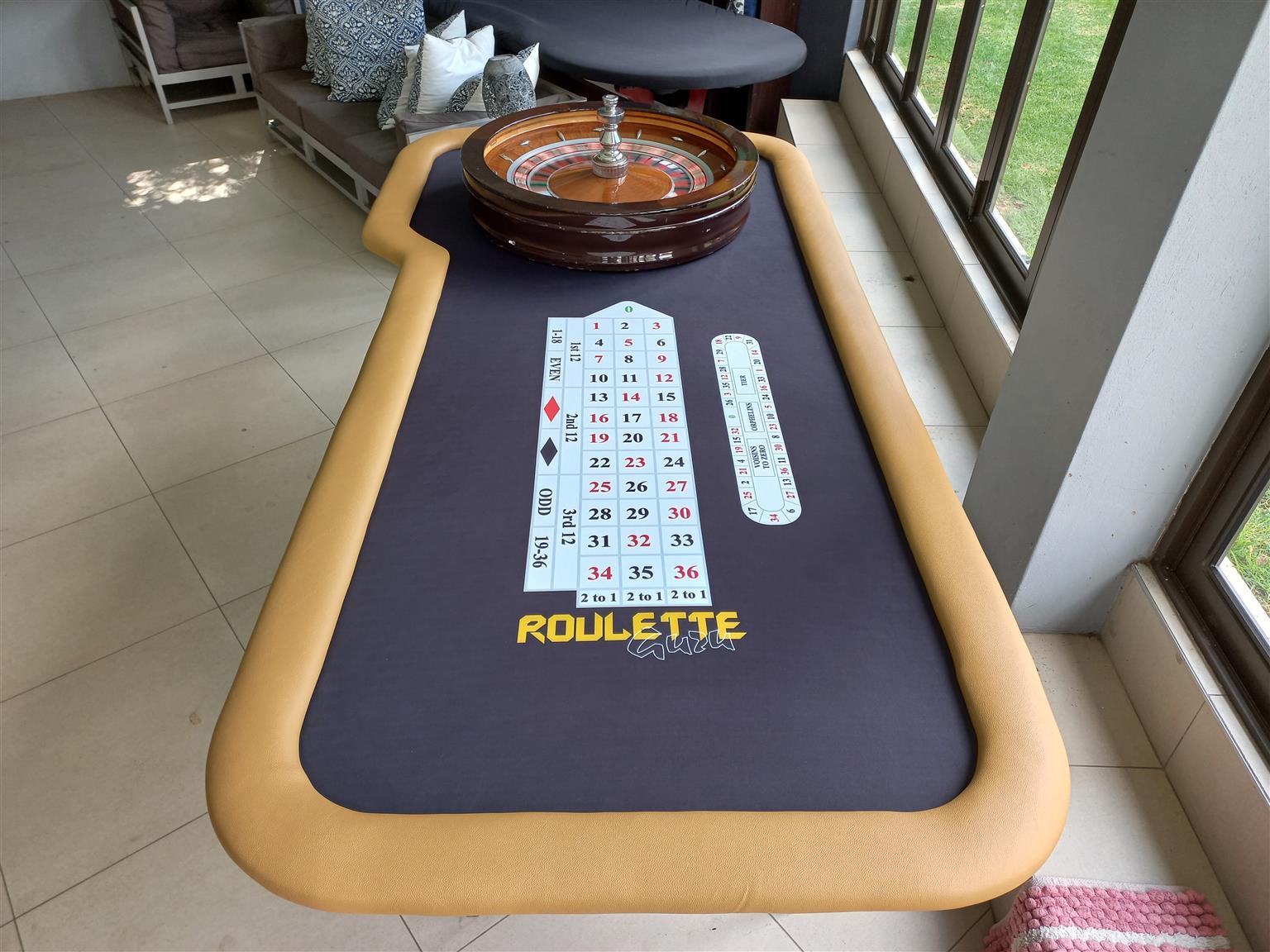 Roulette table and huxley wheel and chips Roulette table and huxley wheel and chips