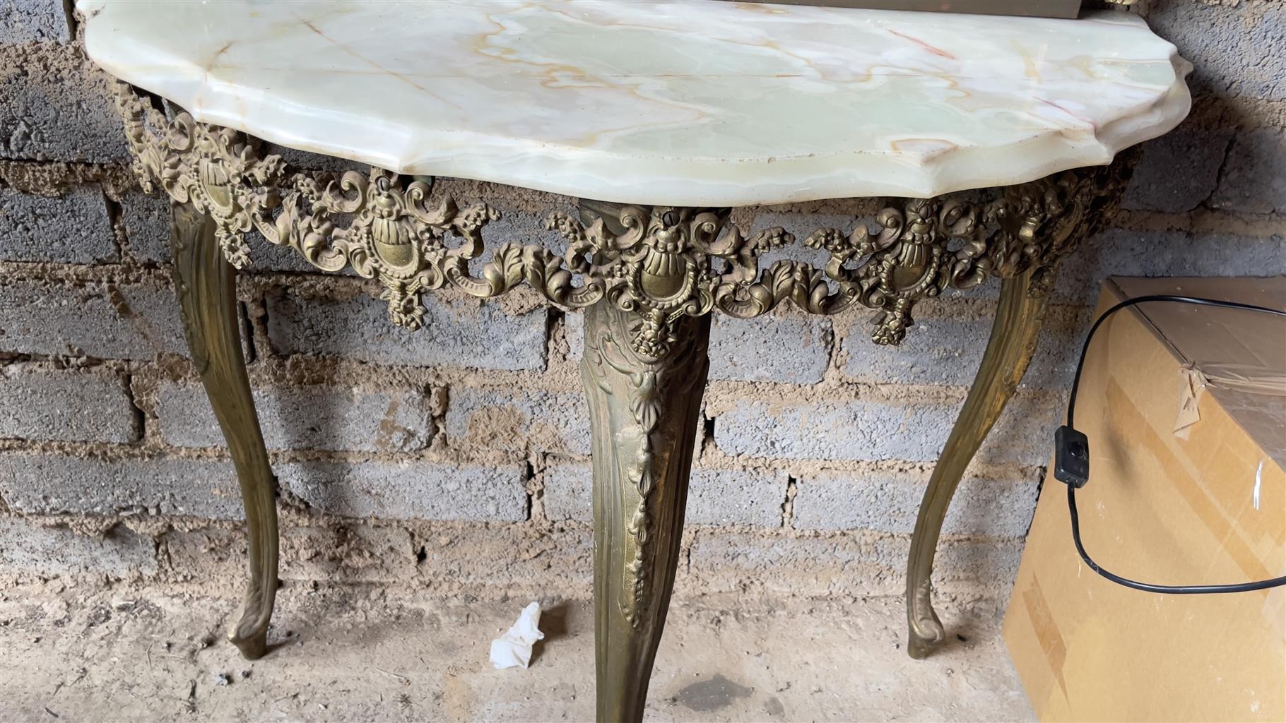 Stunning ornate moulded brass wall mirror and half moon marble table