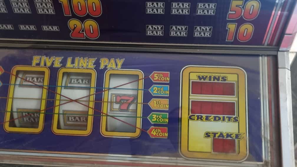 Unrestored Slot Machine -