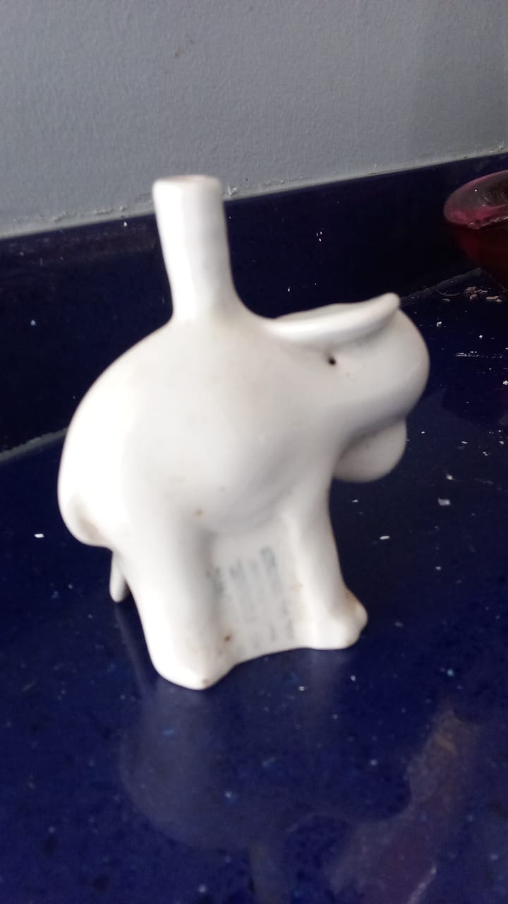 Antique elephant pie funnel