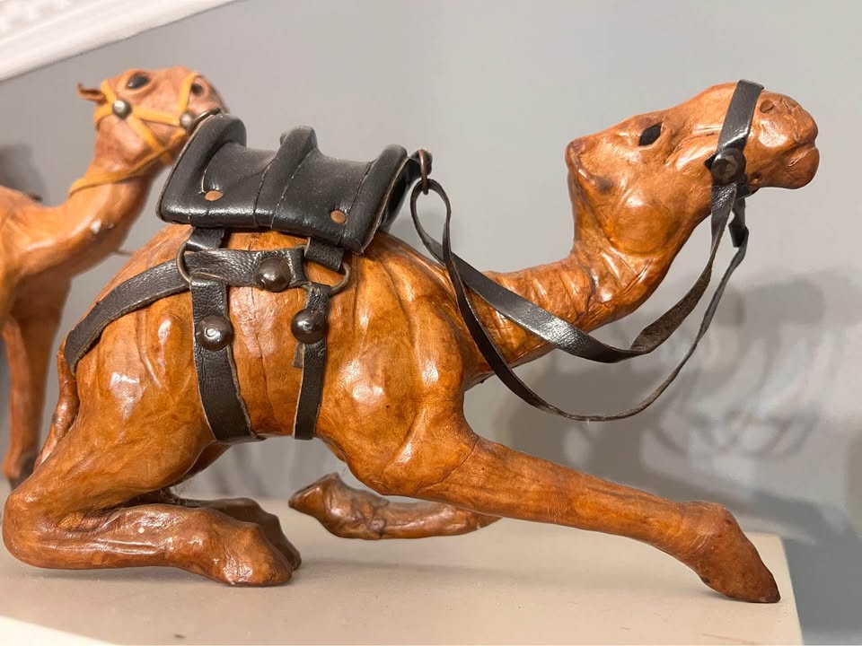 Two small leather camels