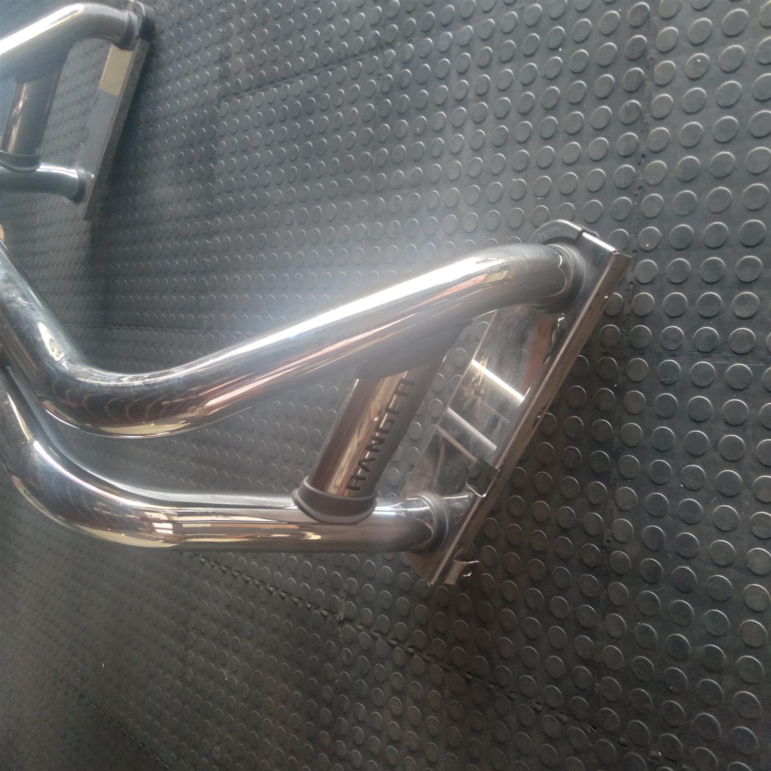 Ford Ranger chrome roll over bar and associated rain clip on cover - Private Seller Ford Ranger chrome roll over bar and associated rain clip on cover - Private Seller