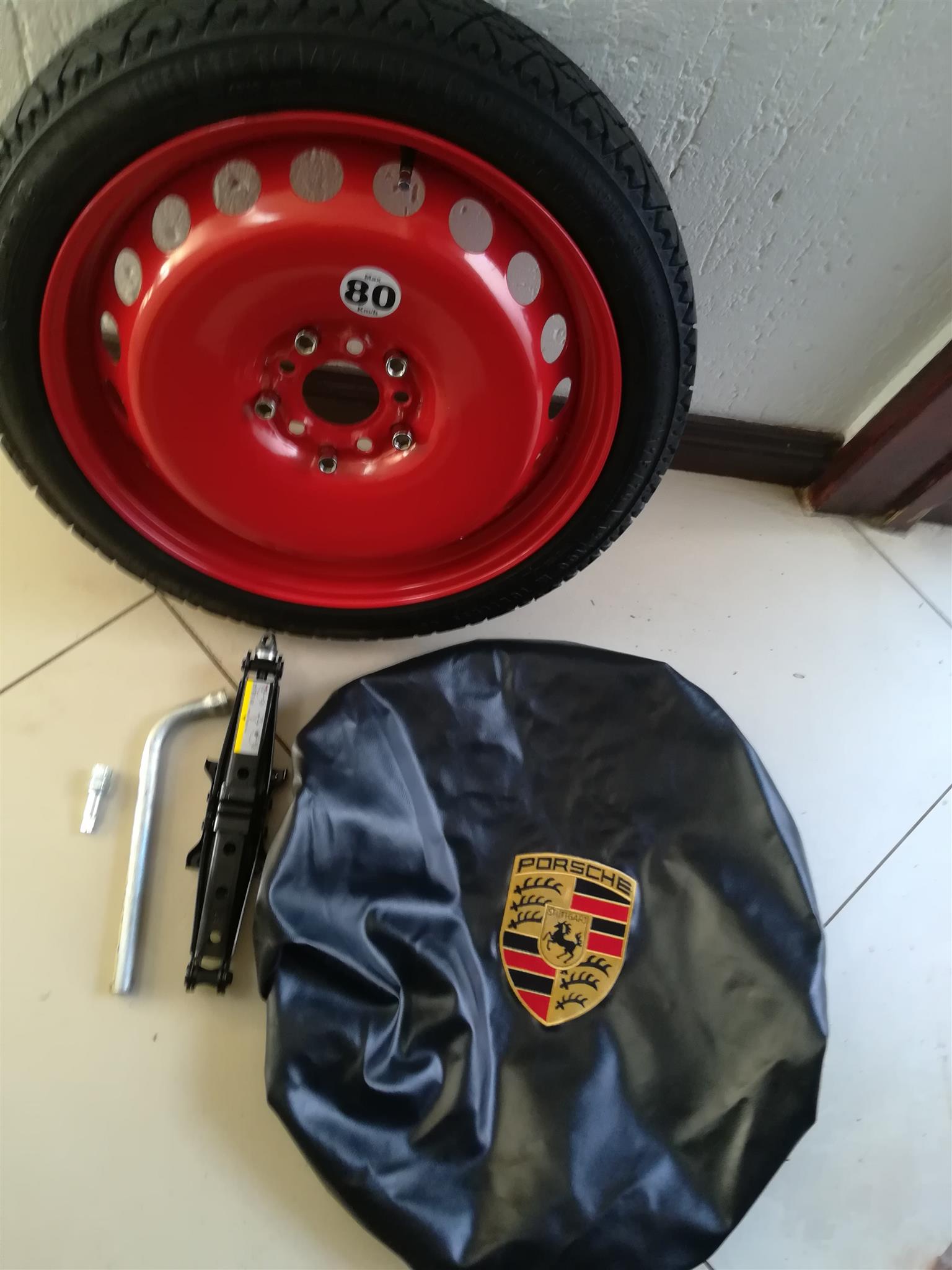 Porsche Cayman19 inch Space Wheel with Jack Set and Special Bolts plus bag - Private Seller Porsche Cayman19 inch Space Wheel with Jack Set and Special Bolts plus bag - Private Seller