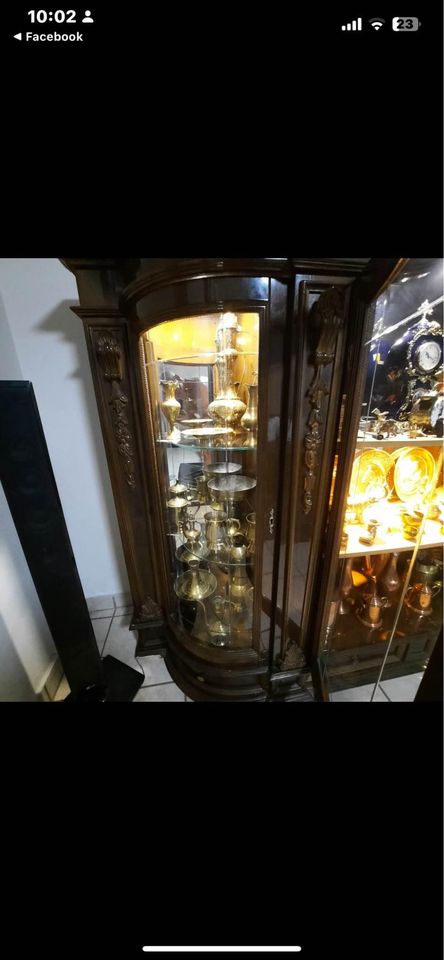 Display cabinet  Antique for both.It doesn’t come with ornaments  Whatsapp