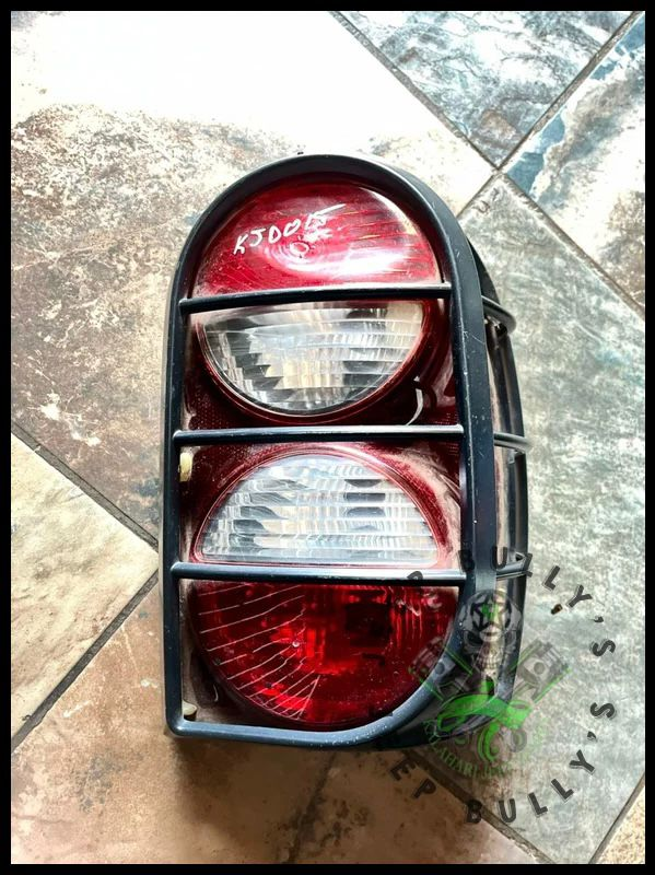Jeep Liberty (KJ) Renegade Driver Side Tail Light with Guard - Private Seller Jeep Liberty (KJ) Renegade Driver Side Tail Light with Guard - Private Seller