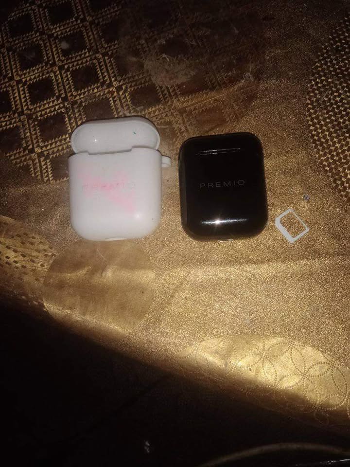 Premio Earbud + case. Still New . Working nicely Premio Earbud + case. Still New . Working nicely
