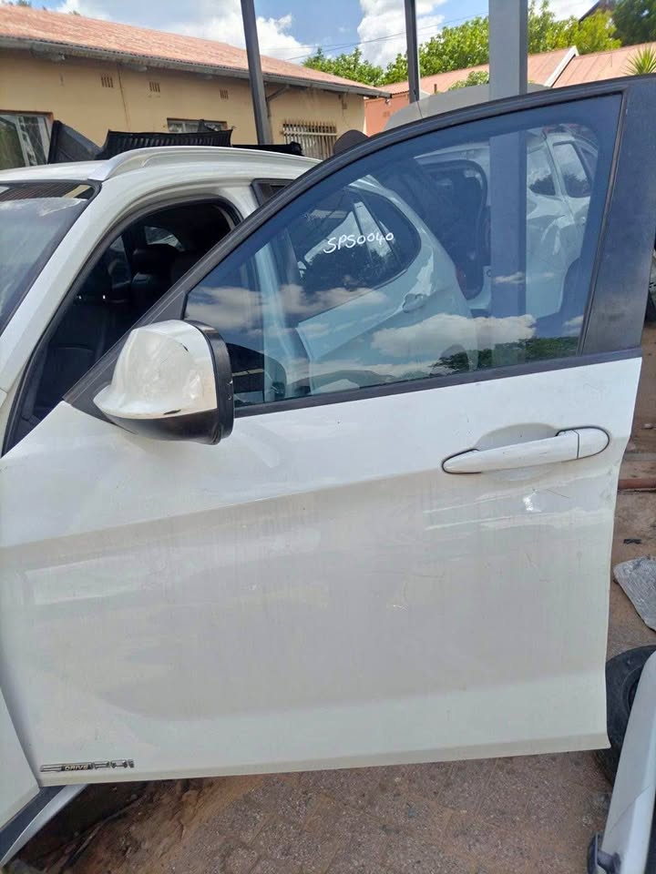 BMW X1 RARE LEFT AND RIGHT FRONT DOORS FOR SALE CALL: or  WHATSAPP: - Private Seller