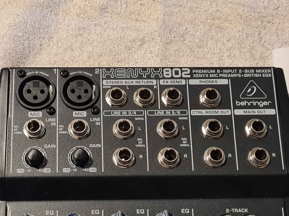 Behringer Xenyx 802 audio mixer.