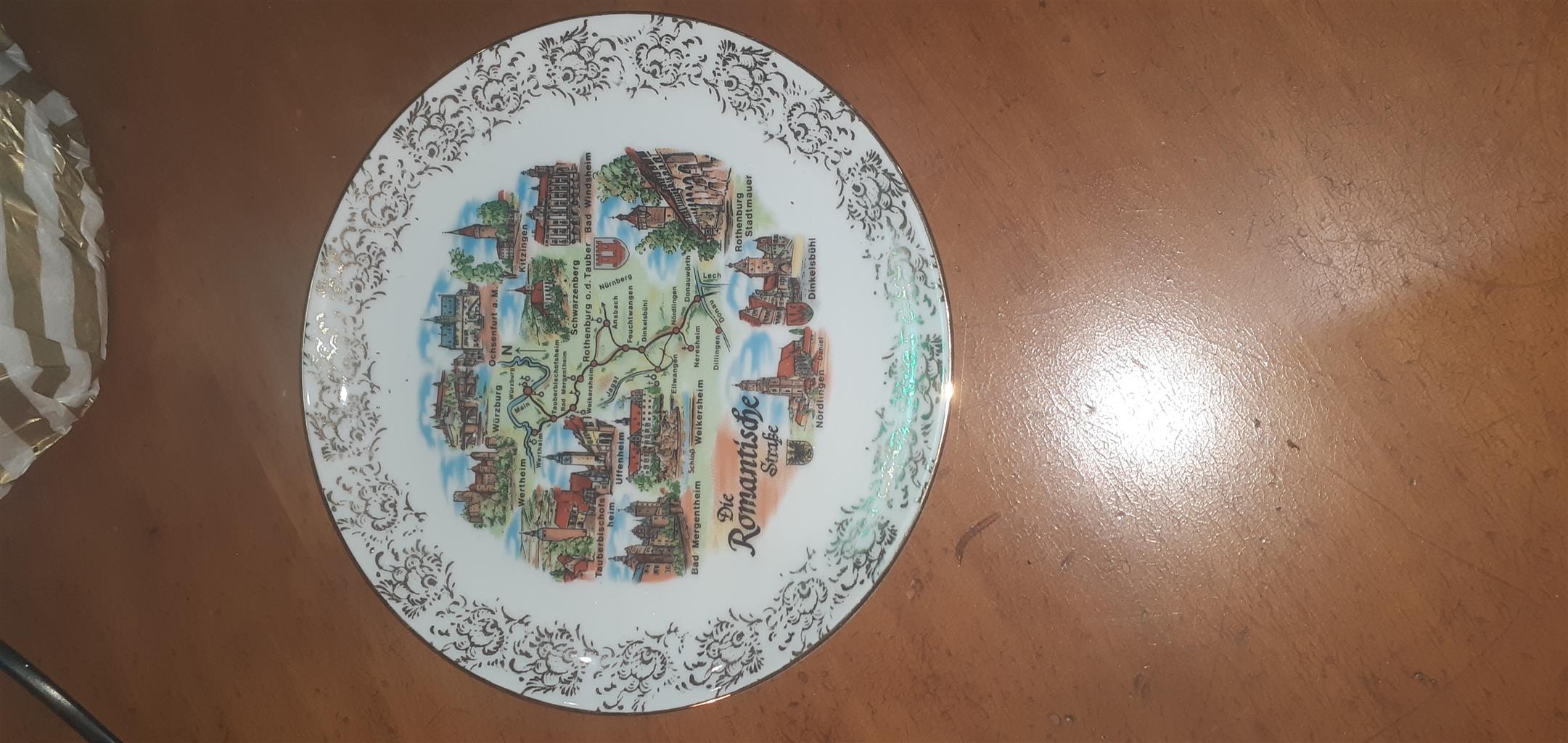 vintage German porcelain collector plate depicting a map of th vintage German porcelain collector plate depicting a map of th