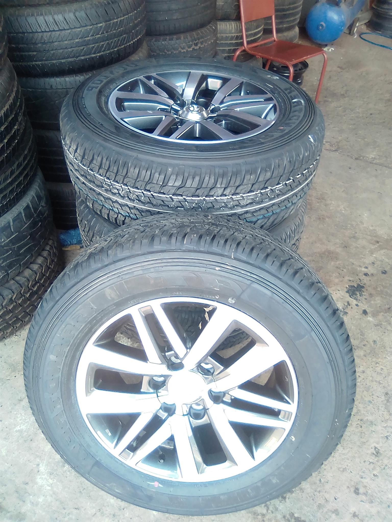 18" Toyota Hilux/Fortuner original mags with 265/60/18 Dunlop Grandtreck A/T set - Private Seller 18" Toyota Hilux/Fortuner original mags with 265/60/18 Dunlop Grandtreck A/T set - Private Seller