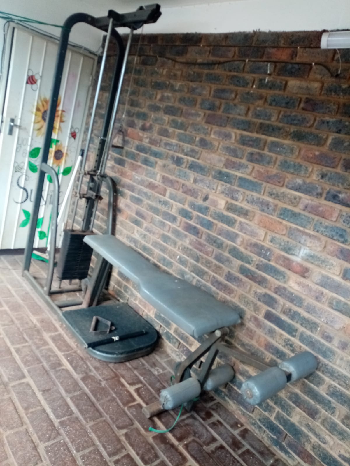 Heavy duty upright standing gym and bench