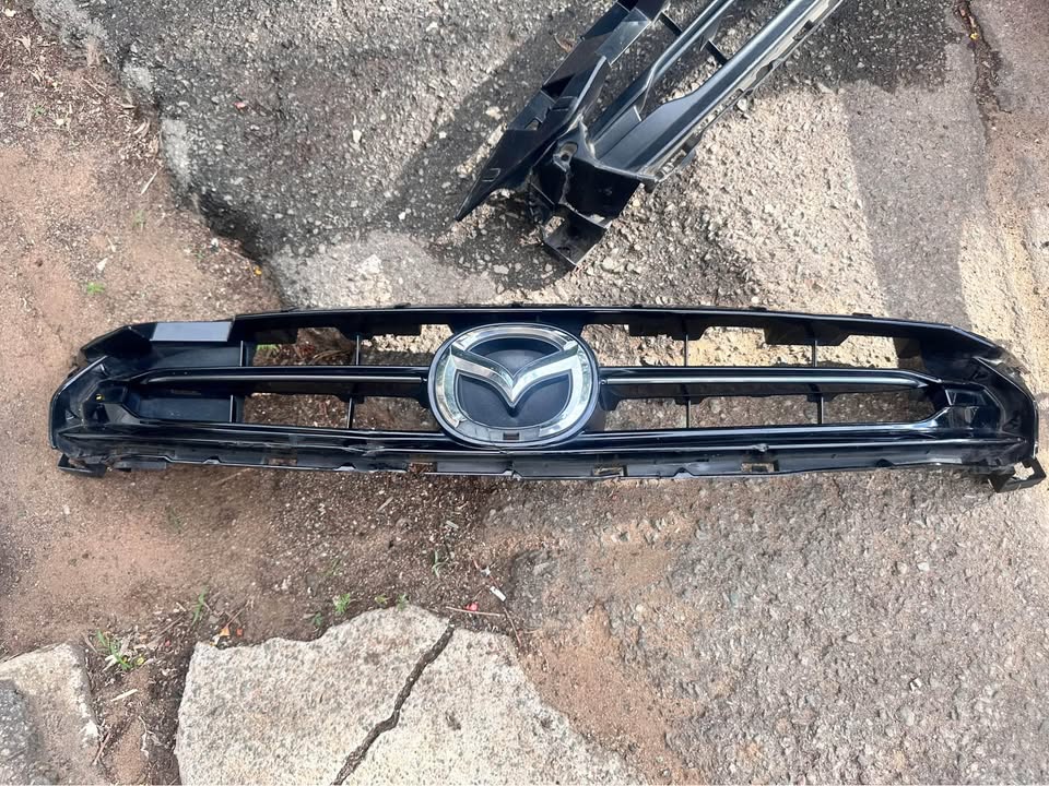 Mazda 2 sky active front glossy grill - Private Seller Mazda 2 sky active front glossy grill - Private Seller