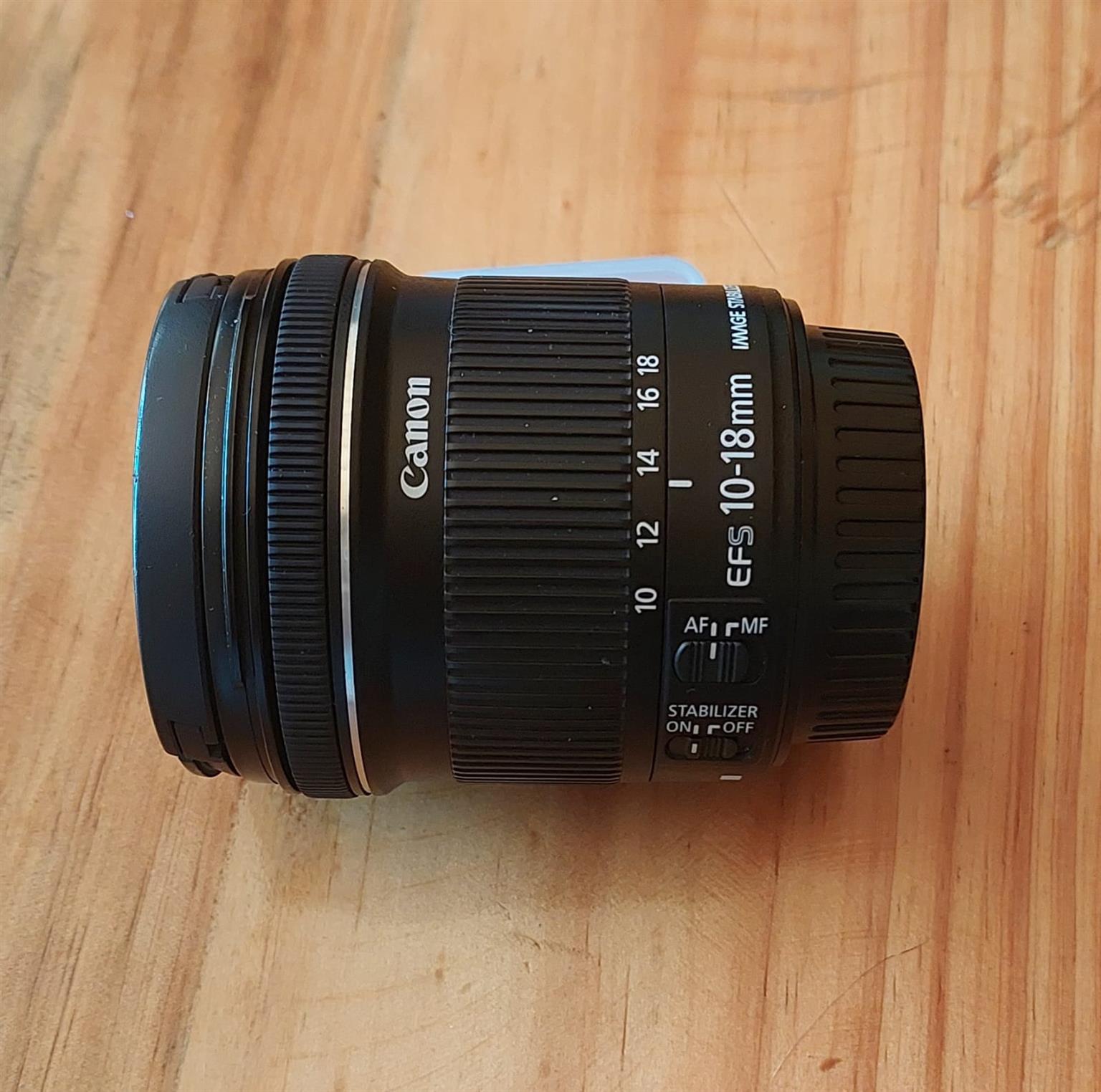 Canon EOS 2000D Camera, Canon 18-55mm lens, bag, battery, memory card
