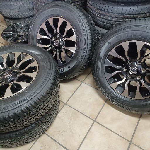 Gazoo hilux rims and Dunlop grandtrek AT25