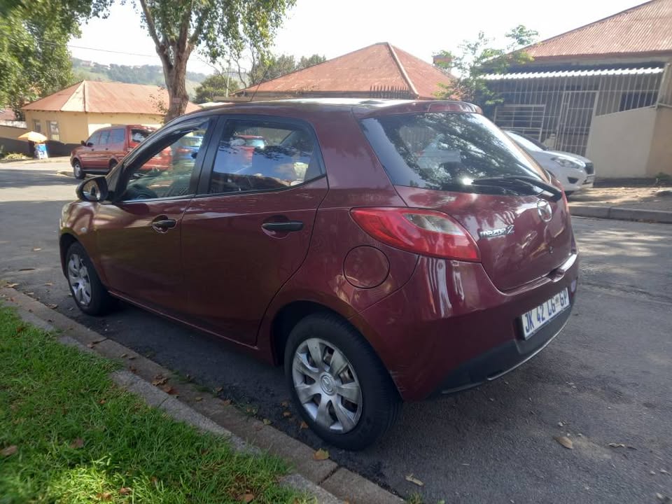 2011 MAZDA 2 1.5 Petrol, Manual, 85k Call Innocent . Maroon Color, Mileage