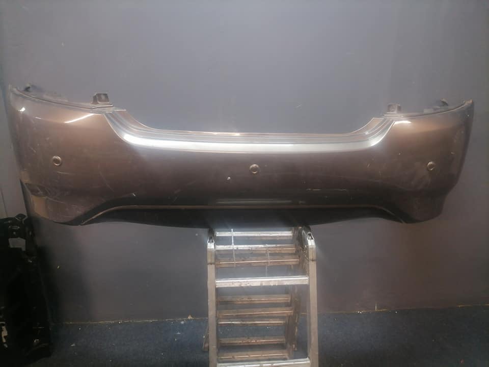 Nissan Almera gold rear bumper DM or contact number in the description for assistance. - Private Seller