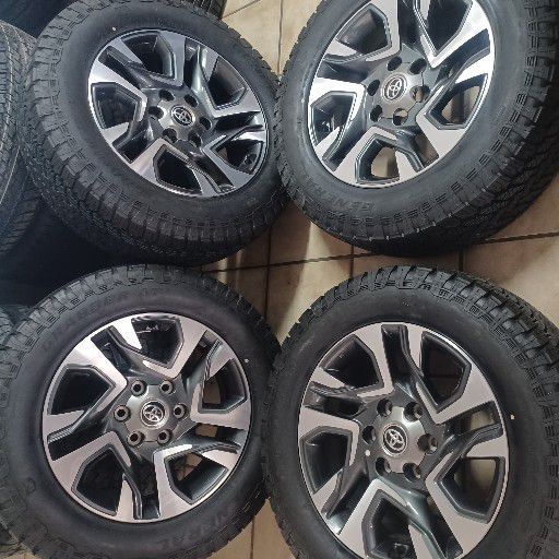 Toyota fortuna rims and general grabber at3