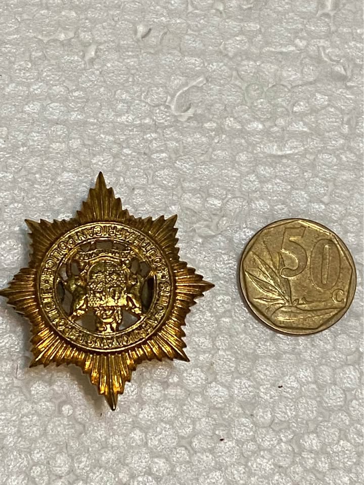 Vintage brass South African Police pin