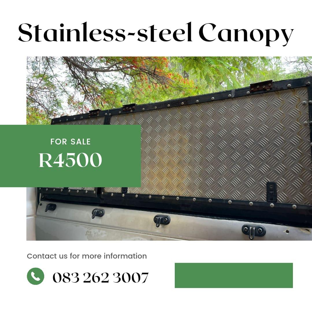 CanopyLeather Lshape couches Ball & Claw set8Seater table & chairs