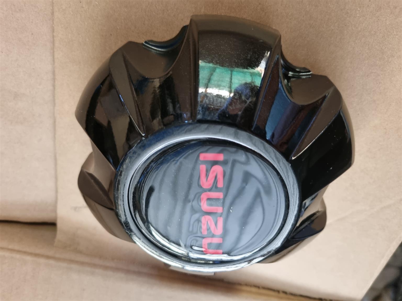 Isuzu mag centre caps - Private Seller Isuzu mag centre caps - Private Seller