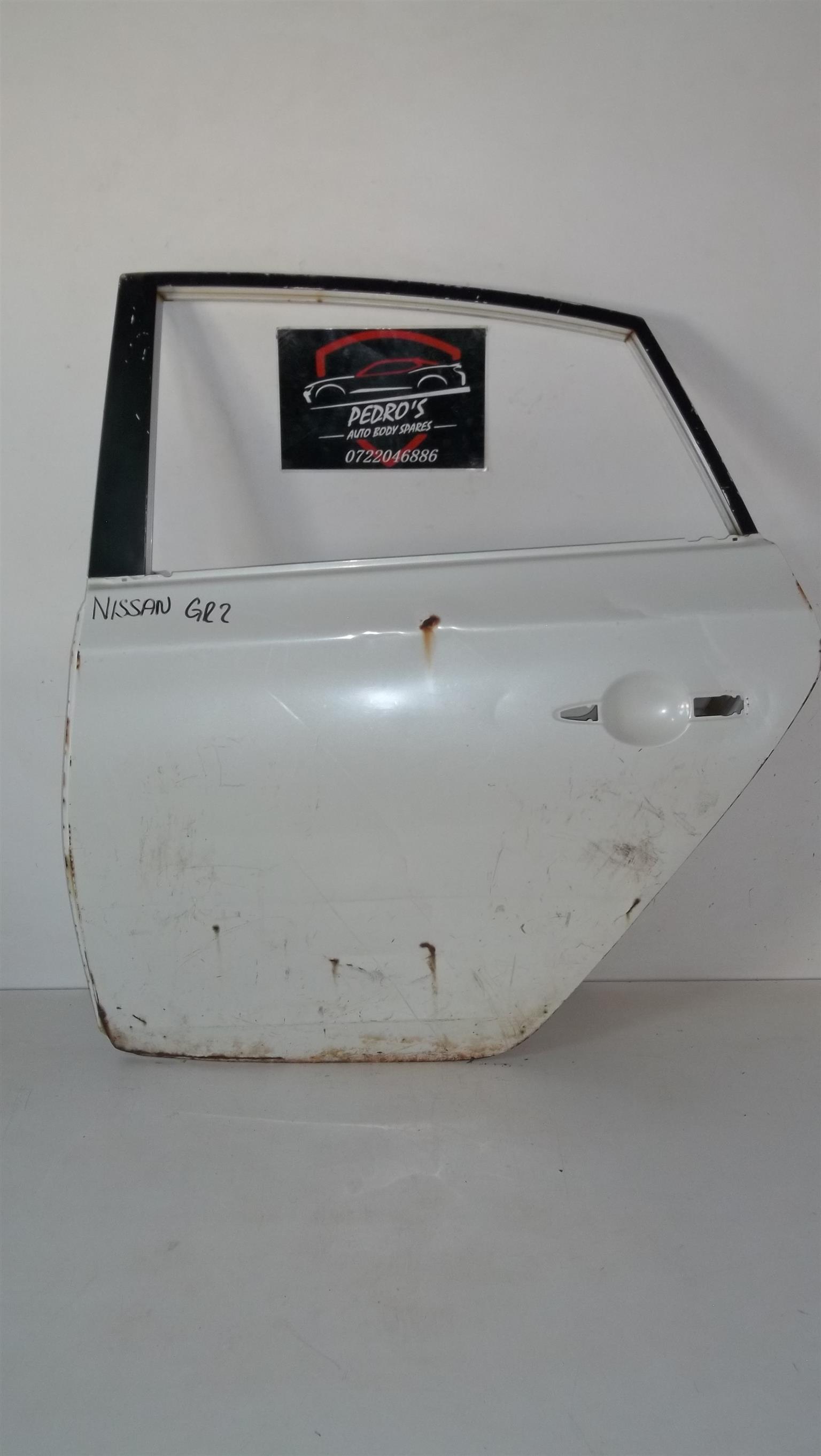 Nissan Sentra 2013 left rear door - Private Seller Nissan Sentra 2013 left rear door - Private Seller