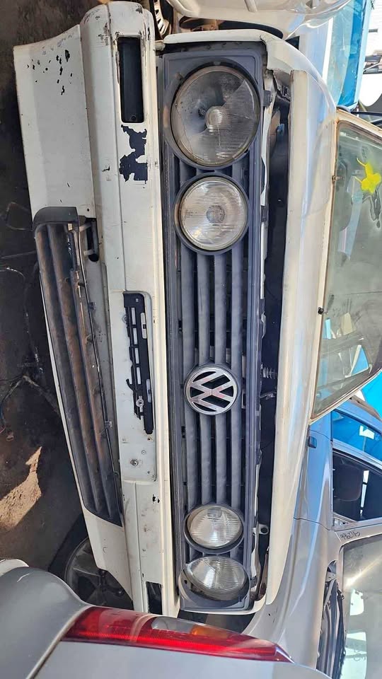 City golf front grill and head lights avaible