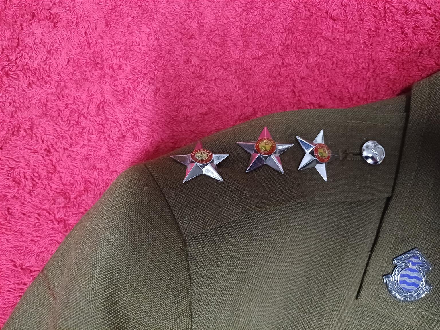 Military uniform collectors items for sale.