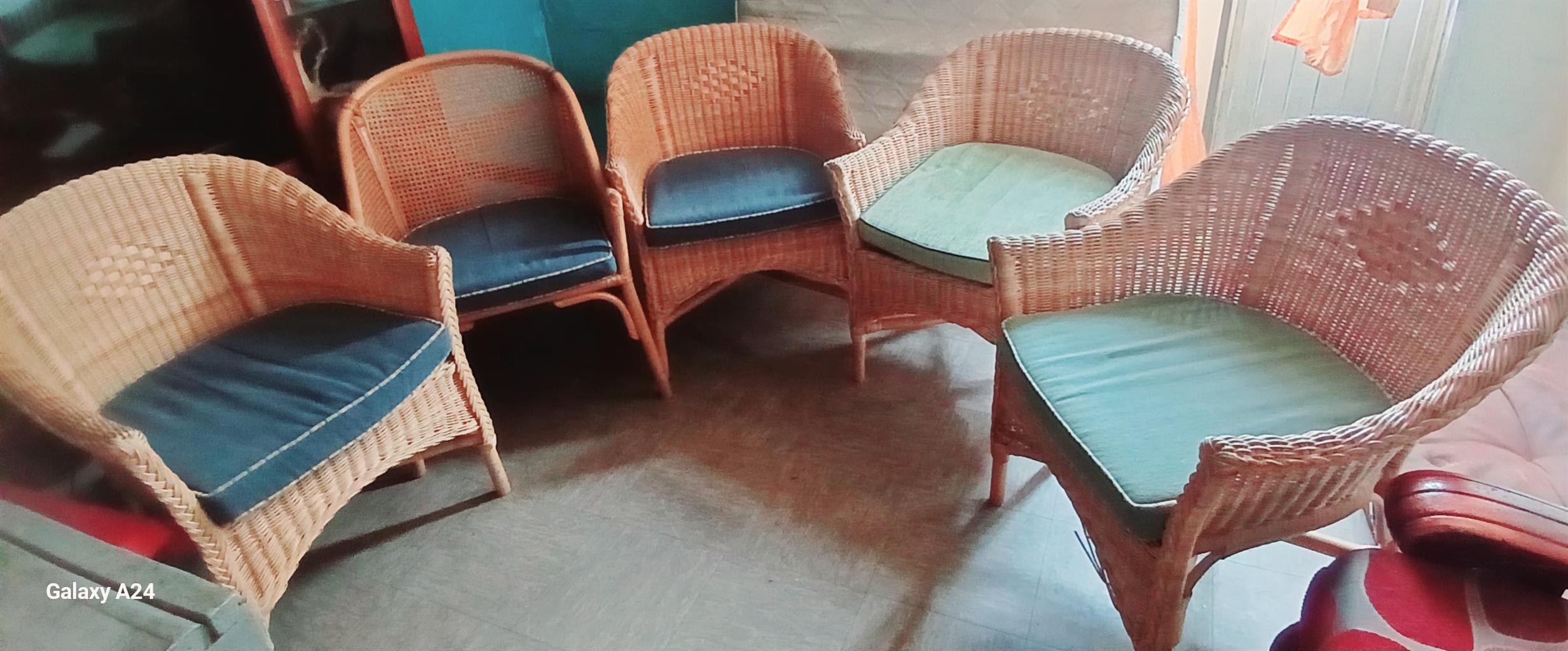 Vintage Cane wood double barrow chairs and glass top coffee table