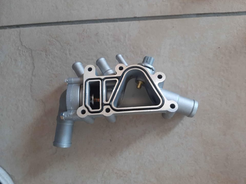 FORD ROCAM ALUMINUM THERMOSTAT HOUSING. FOR VARIOUS OTHER CARS. - Private Seller
