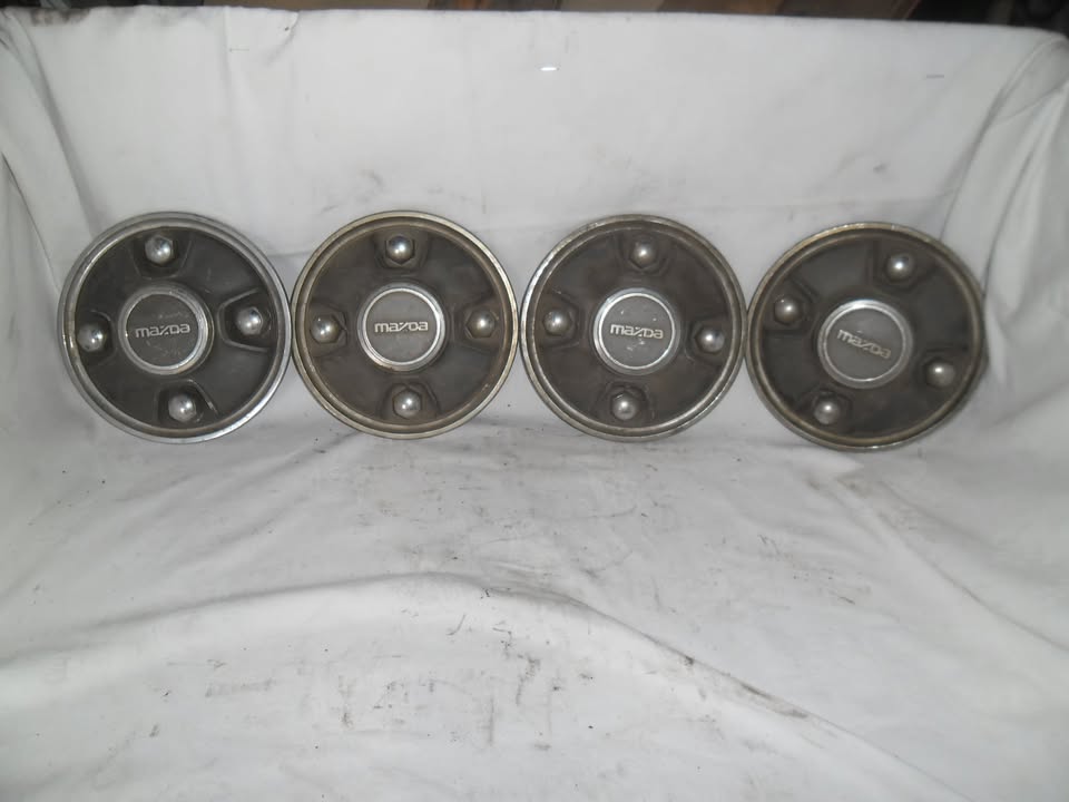 Mazda wheel cap set - Private Seller Mazda wheel cap set - Private Seller