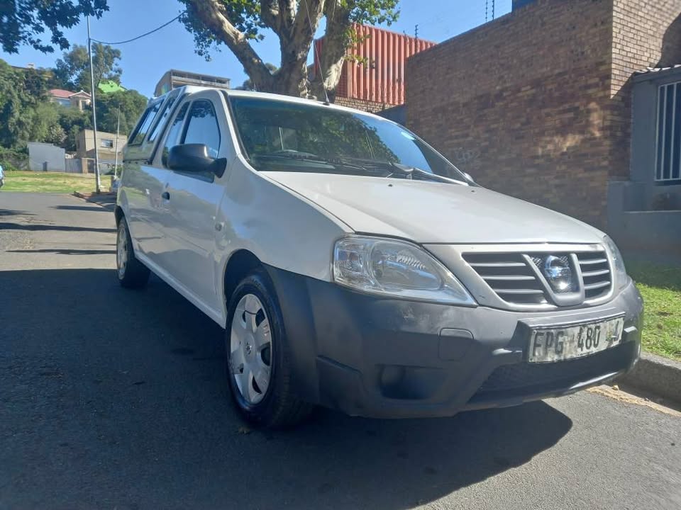 2012 NISSAN NP200 BAKKIE 1.6  Petrol, Manual, White Color, Mileage . Canopy.