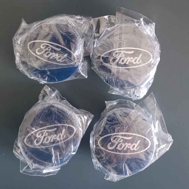 Ford 54mm wheel centre caps emblems - Private Seller Ford 54mm wheel centre caps emblems - Private Seller