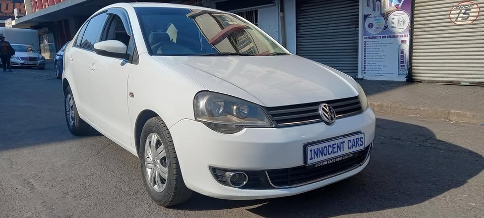 2015 POLO VIVO CONCEPTLINE 1.4 AUTOMATIC, WHITE COLOUR, 87000KM