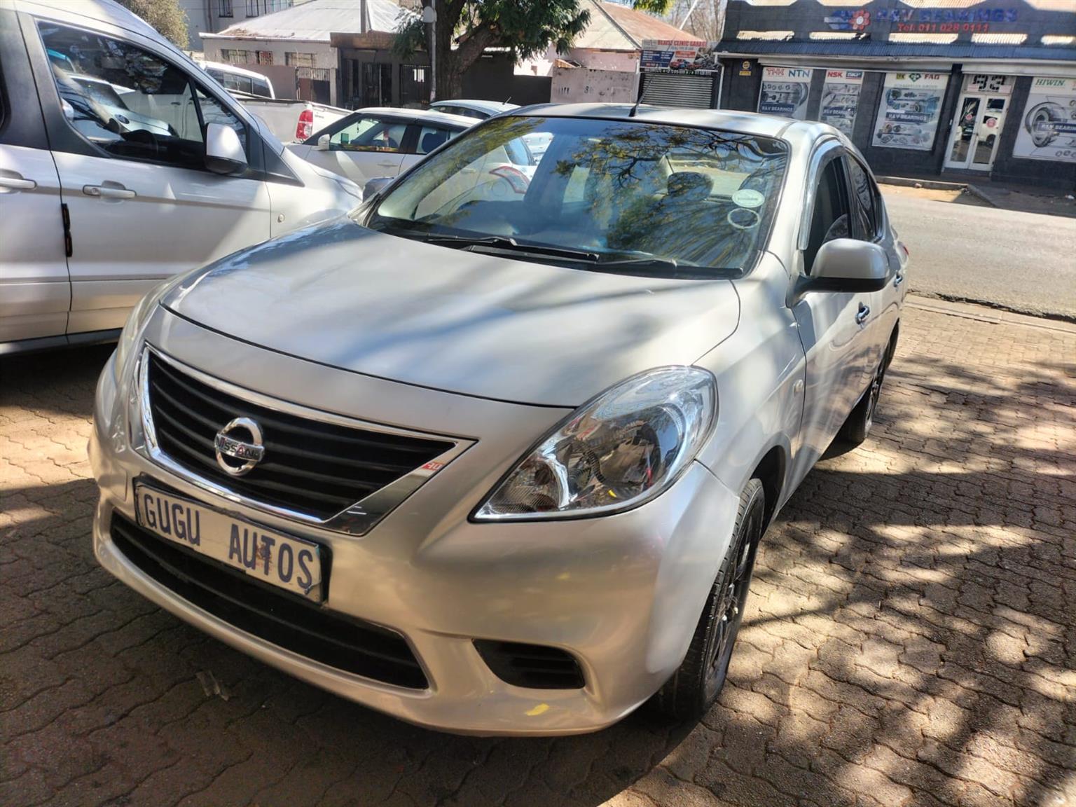 2015 Silver Nissan Almera sedan 1.5 Manual milage 86,000 km petrol