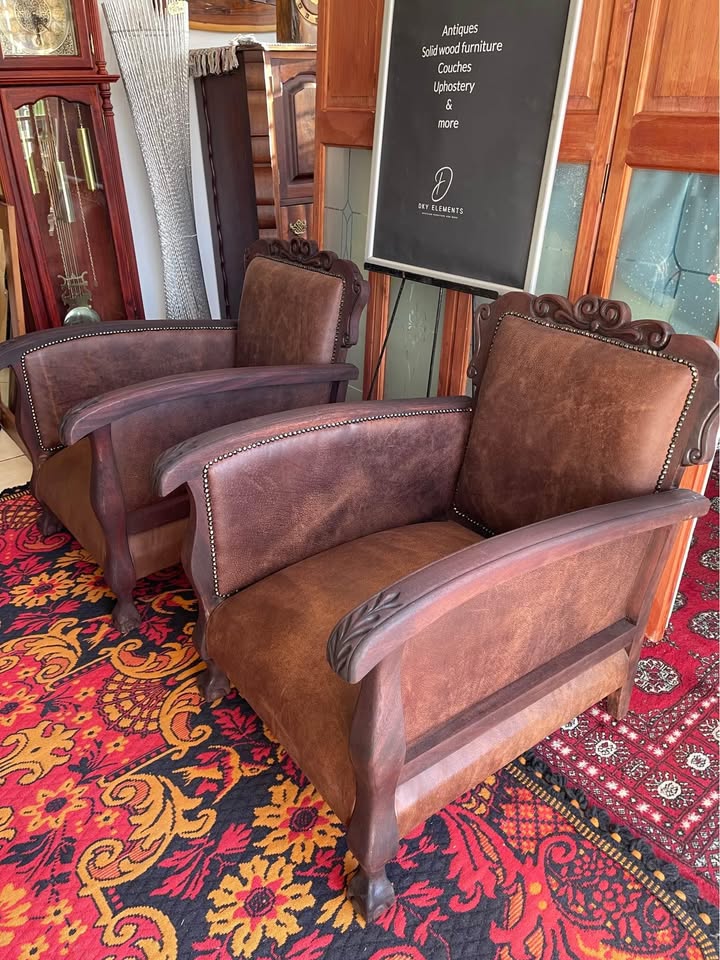 Antique Chairs - upholstered in brown buffalo leather ( price is per chair)