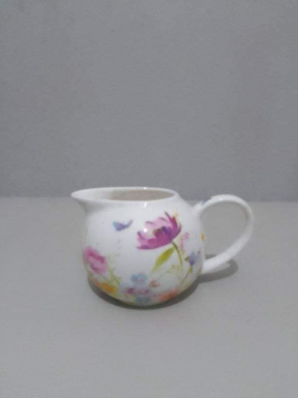 A Milk jar A Milk jar