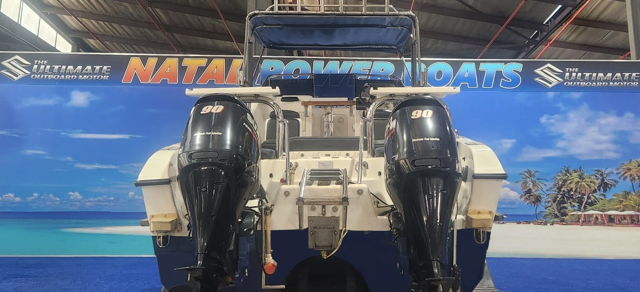 GAMEFISH 595 ON TRAILER 2 X 90 HP SUZUKI 4 STROKES 2012 MODELS 600 HOURS