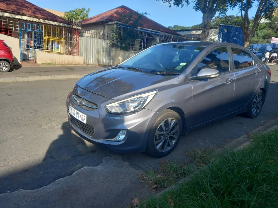 2017 HYUNDAI ACCENT SEDAN  1.6 FLUID PETROL, MANUAL, GREY, 77000kms