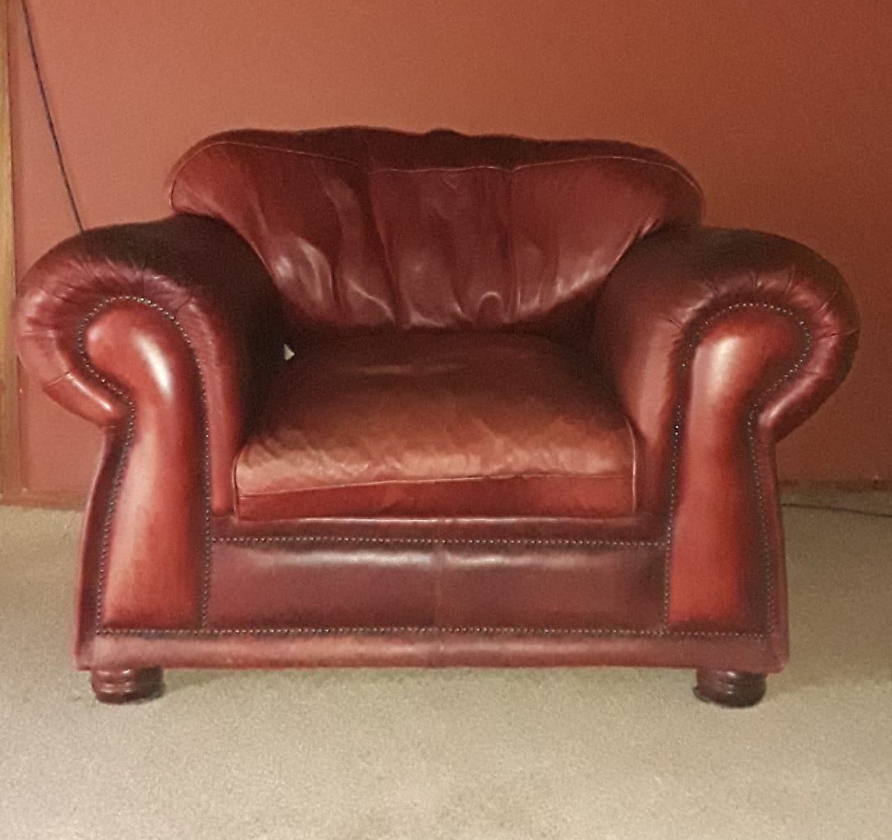 Burgundy genuine leather lounge suite good condition