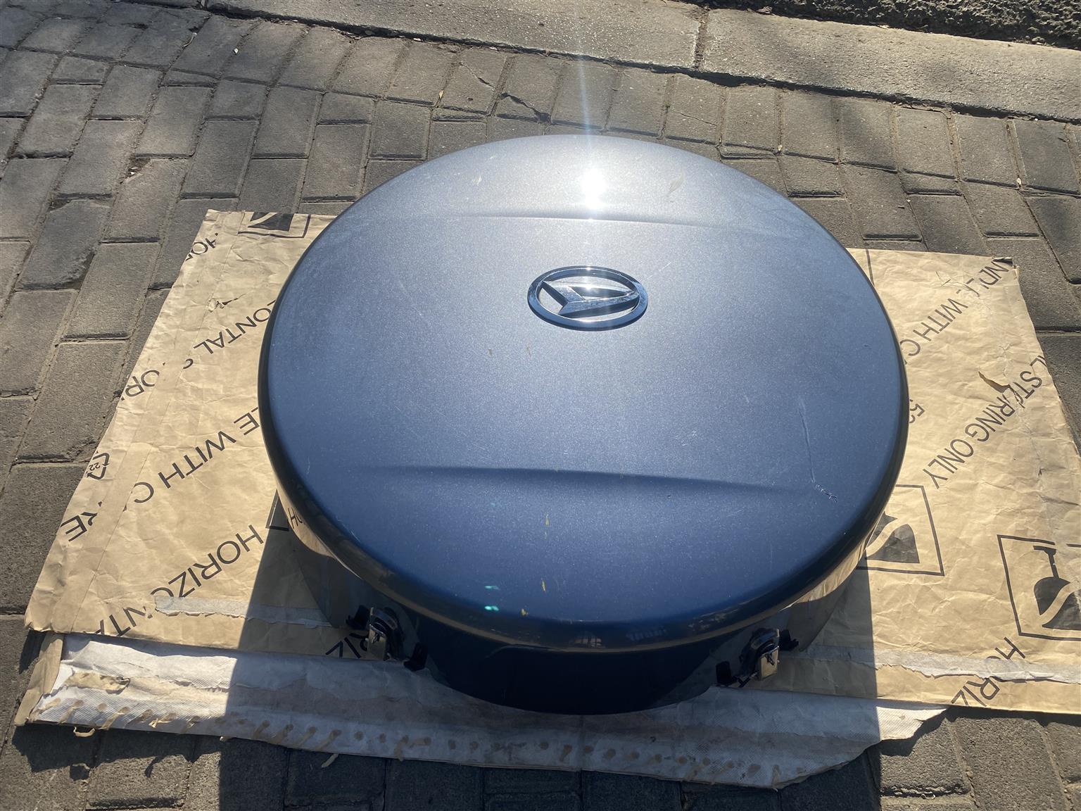 2010 DAIHATSU TERIOS COMPLETE SPARE WHEEL COVER FOR SALE. IN PRISTINE CONDITION