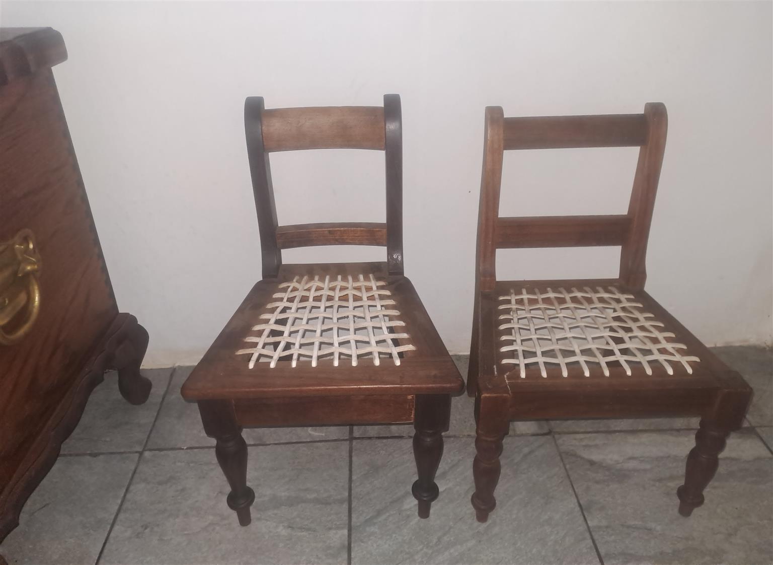 Antique Jonker Knysna children's riempie chair with an aditional chair Antique Jonker Knysna children's riempie chair with an aditional chair