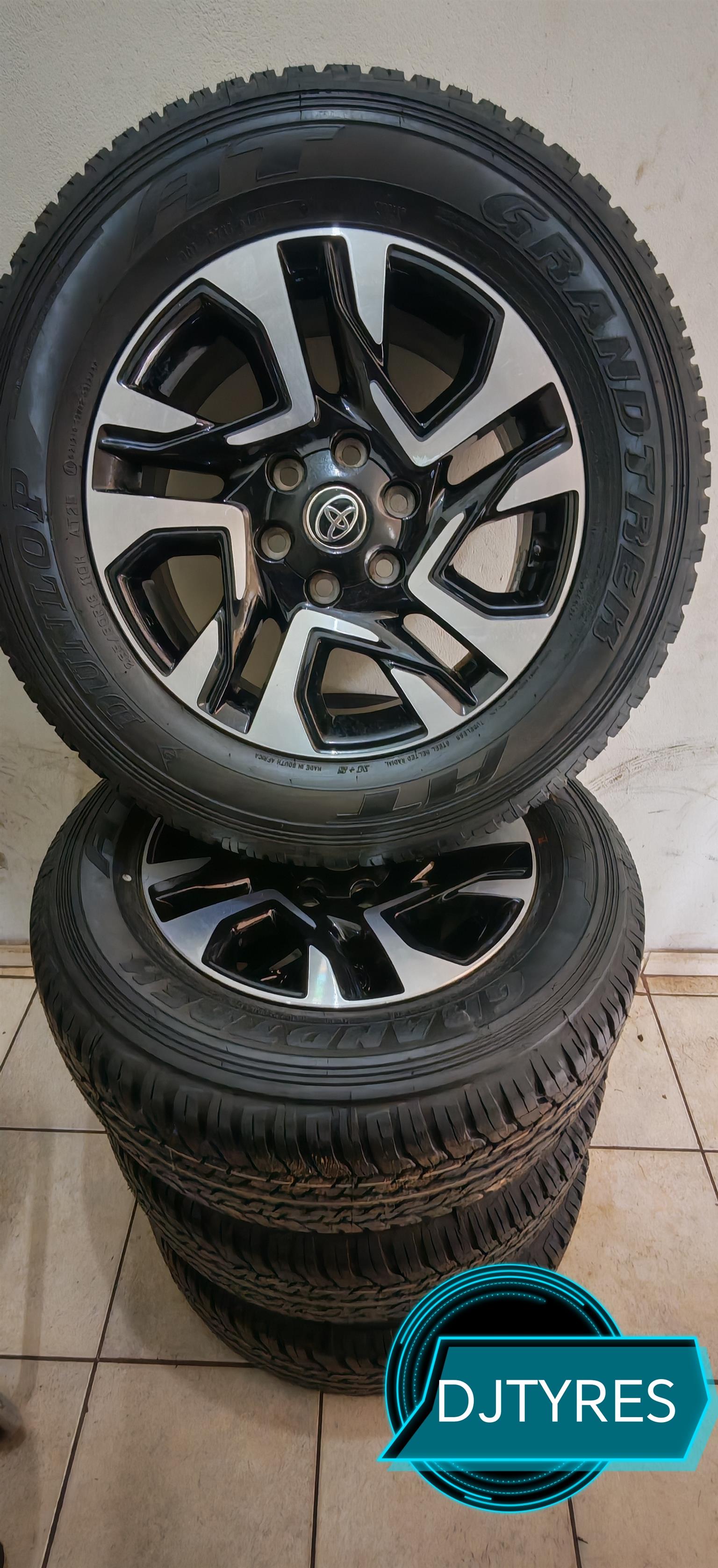OEM Toyota Legend55 rims with dunlop grandtrek AT25 - Private Seller