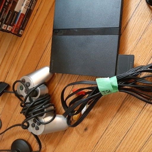 Sony ps2 with 1 free game of your choice