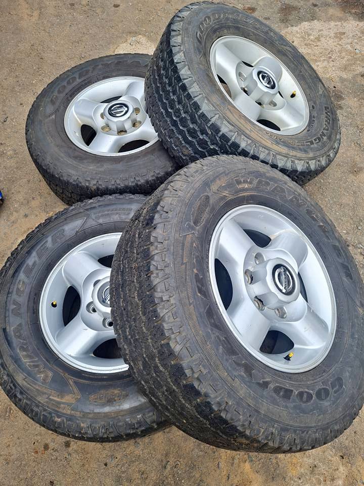 Nissan Hardbody np300 original alloy mags size 16+tyres 265/70/16 - Private Seller Nissan Hardbody np300 original alloy mags size 16+tyres 265/70/16 - Private Seller