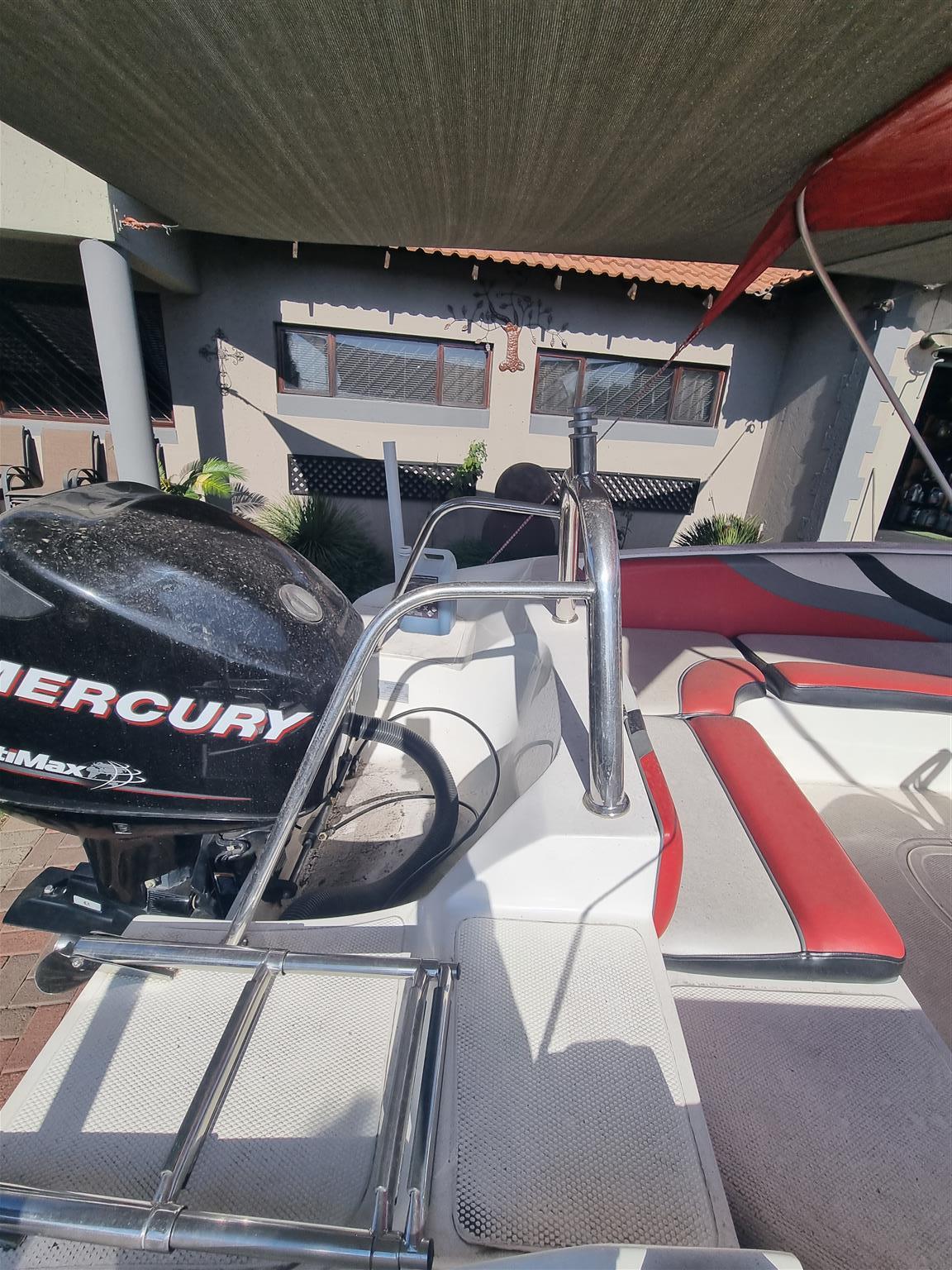 18 ft Exspression Funster boat with 150 Optimax Murcury Motor