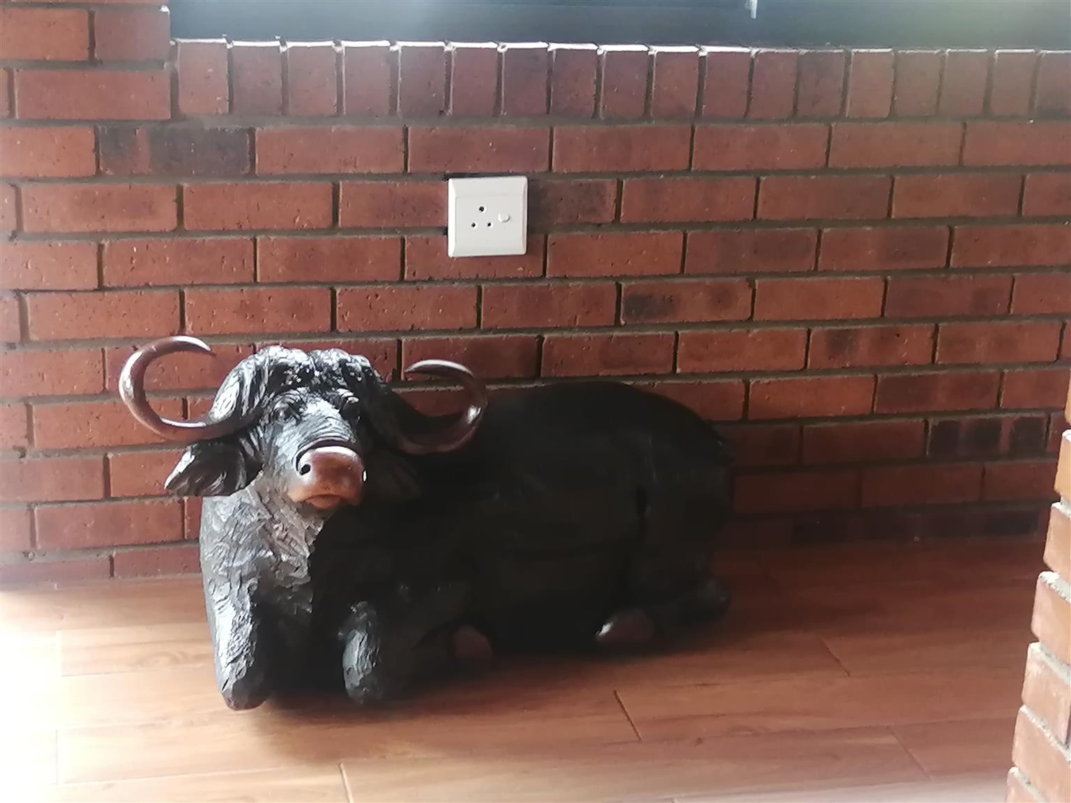 Large Wooden Animal Sculptures. Pair of Buffaloes carved from solid iron wood.